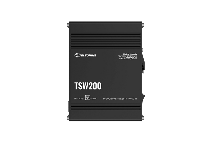 Direct top-down view of the Teltonika TSW200 rugged casing, showcasing the heat-dissipating cooling ridges, "Made in Lithuania" manufacturing stamp, and voltage input range parameters.